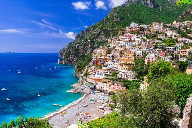 Capri Island Boat Tour from Amalfi with Snorkeling | Small Group - Capri from the sea: Villa Jovis, Faraglioni, and the cave network