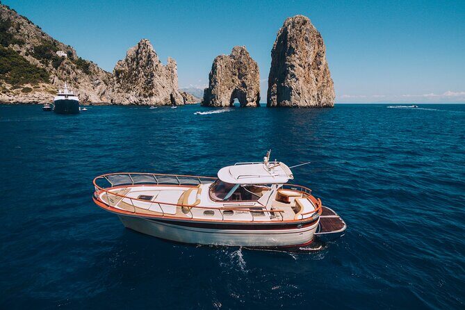 Capri Private Boat Day Tour from Sorrento, Positano or Naples - Faraglioni, the hole in the rock, and why sea-level views win