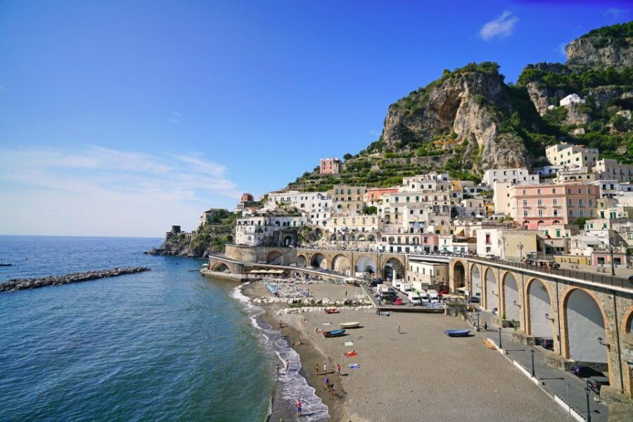 From Amalfi: 7H Amalfi Coast - Group Tour by boat - What you pass by: Atrani, waterfalls, and “tiny town” vibes