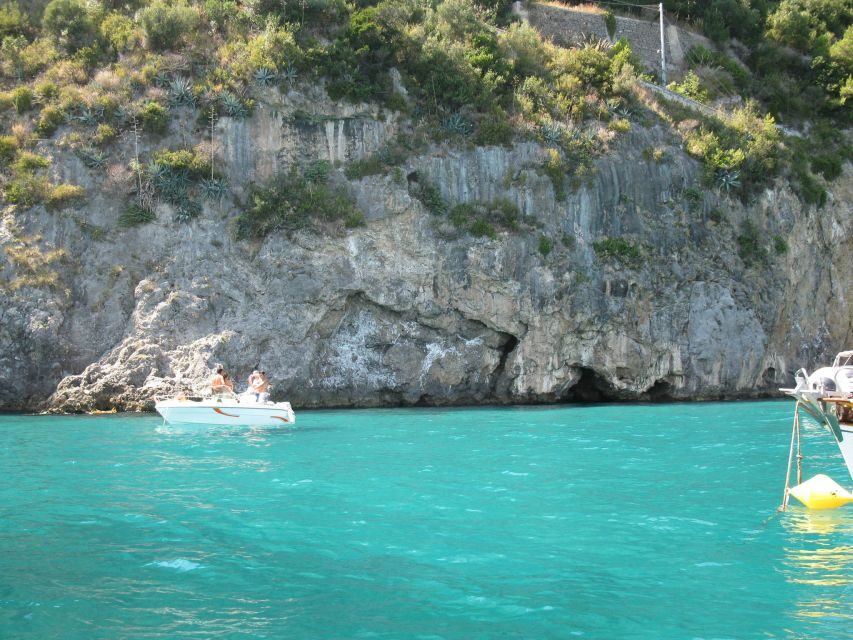 From Amalfi: Day Trip to Capri Private Boat Tour with Drinks - Faraglioni, Casa Malaparte, and Marina Grande: the iconic views from the best angle