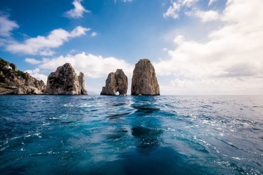 From Positano: Full-Day Boat Trip to Capri - The boat tour around Capri: grottos, Faraglioni, and Punta Carena