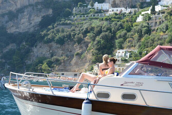 Positano & Amalfi Boat Tour from Sorrento: Swim & Light Lunch - The cruise portion: Marina Grande to Roman ruins to a cliff waterfall