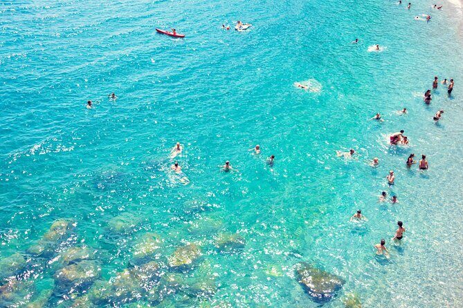 Positano & Amalfi Boat Tour from Sorrento: Swim & Light Lunch - Amalfi town time: 2 hours, cathedral sights, and lemon granita